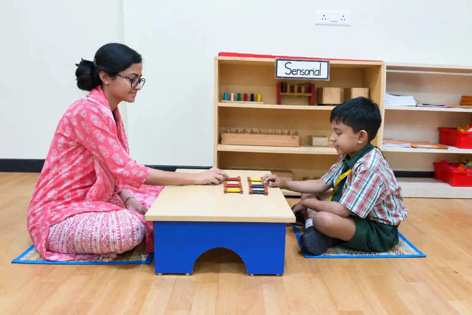 Children learning through interactive play and group activities